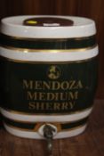 A VINTAGE MENDOZA MEDIUM SHERRY BARREL COMPLETE WITH TAP
