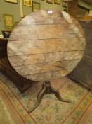 AN ANTIQUE OAK PEDESTAL TRIPOD TABLE A/F