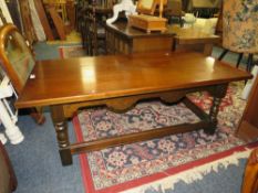 A LOW OAK RECTANGULAR COFFEE TABLE