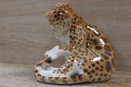 A LOMONOSOV CERAMIC FIGURE OF A LEOPARD