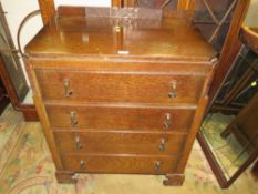A VINTAGE OAK FOUR DRAWER CHEST W-79 CM