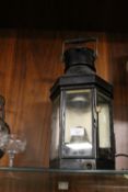 AN ANTIQUE PULLPIT SHIP LAMP