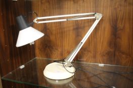 AN ANGLE POISED LAMP