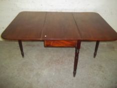 AN ANTIQUE MAHOGANY DROPLEAF TABLE
