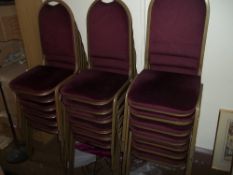 A QUANTITY OF STACKING CHAIRS