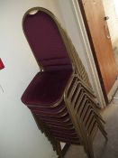 A QUANTITY OF STACKING CHAIRS