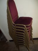 A QUANTITY OF STACKING CHAIRS