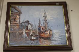 A FRAMED OIL OF A HARBOUR SCENE