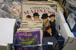 APROXIMATLEY 25 LP RECORDS TO INCLUDE MADNESS, DAVID BOWIE, ABBA, ETC TOGETHER WITH OVER 50 SINGLES