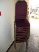 A QUANTITY OF STACKING CHAIRS