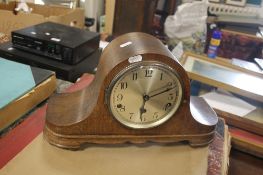 A NAPOLEON HAT MANTEL CLOCK