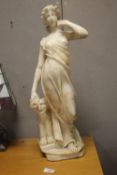 AN ALABASTER FIGURE