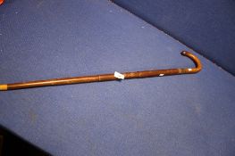 AN EDWARDIAN WALKING STICK UMBERELLA