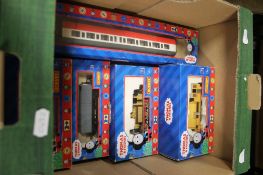 A COLLECTION OF 7 BOXED THOMAS THE TANK ITEMS
