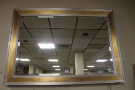 A LARGE MODERN MIRROR 106 X 76 CM