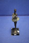 A BRONZE FIGURE OF A BALLERINA ON A WOODEN BASE