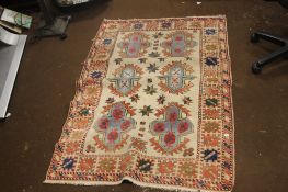 A VINTAGE WOOLEN RUG