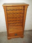 A PINE WINE RACK/CUPBOARD
