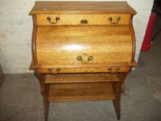 AN ANTIQUE OAK WRITTING BUREAU