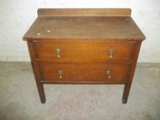 AN ANTIQUE 2 DRAWER CHEST OF DRAWERS