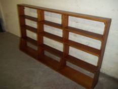 A MAHOGNANY TYPE WIDE BOOKSHELF