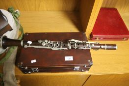 AN ANTIQUE ROSEWOOD CLARINET A/F