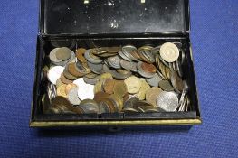 A TIN OF WORLD COINS