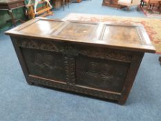 AN 18TH CENTURY OAK CARVED COFFER, W 123 cm