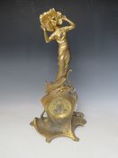 A FRENCH ART NOUVEAU GILT METAL FIGURATIVE MANTEL CLOCK, the movement stamped 4137, with pendulum, H
