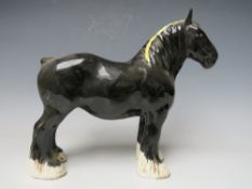 A BESWICK MODEL OF A SHIRE MARE IN BLACK GLOSS FINISH WITH YELLOW RIBBON, model 818Condition