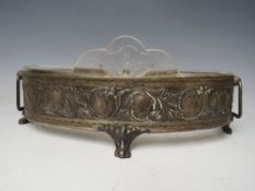 AN ART NOUVEAU OVAL WHITE METAL JARDINIAIRE WITH GLASS LINER, W 26.5 cm