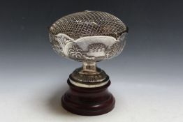 A VERY ORNATE INDIAN WHITE METAL ROSE BOWL ON STAND, with engraving 'With Best Wishes from Executive