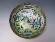 AN UNUSUAL ORIENTAL FAMILLE VERT 'CHICKEN' BOWL, the painted decoration with multiple chicken /