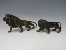 A 20TH CENTURY FINELY CAST BRONZE FIGURE OF A LION, approx L 20 cm, together with a smaller
