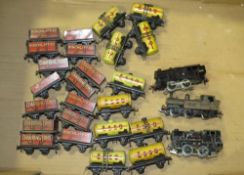 A BOX CONTAINING TRIX MODEL RAILWAY TRUCKS, tankers and three various locomotives