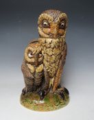 A BURSLEM POTTERY CONTEMPORARY STONEWARE MARTINWARE STYLE GROTESQUE FIGURE OF TWO OWLS, one with the