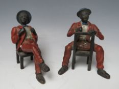 A PAIR OF 20TH CENTURY COLD PAINTED BRONZE FIGURES, both seated, H 11 cm (2)