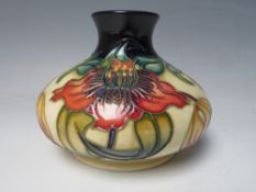 A MOORCROFT ANNA LILY PATTERN SQUAT VASE, impressed and painted marks to underside, H 10.5 cm