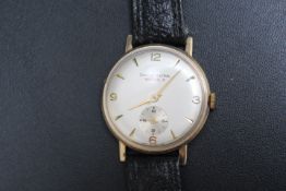 A VINTAGE 9 CARAT GOLD SMITHS ASTRAL NATIONAL 15 WRIST WATCH, Dia 3.25 cm