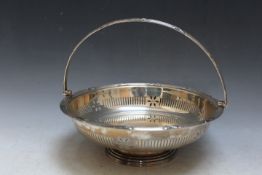 A HEAVY HALLMARKED SILVER PIERCED GALLERY SWING HANDLED BASKET BY JAMES DIXON & SONS - SHEFFIELD