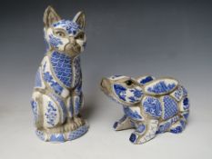 A VINTAGE NANCY LOPEZ BLUE AND WHITE MOSAIC STYLE POTTERY FIGURE OF A SEATED CAT, H 24 cm,
