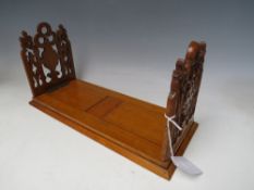 A VICTORIAN OAK GOTHIC BOOK SLIDE