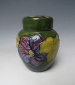 A MOORCROFT ANEMONE PATTERN GINGER JAR AND COVER, impressed marks to the base, H 15.5 cm