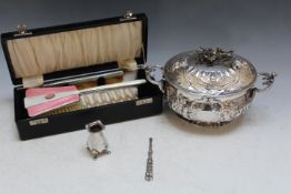 A CONTINENTAL WHITE METAL TWIN HANDLED POT AND COVER, probably plated, three marks to base, see