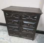 A 17TH CENTURY OAK CHEST OF DRAWERS, having four graduated drawers, each with typical geometric