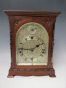 A MAHOGANY CASED J.J. ELLIOTT WESTMINSTER CHIME MANTLE CLOCK, retailed by E.H. Lawley & Sons Ltd.,