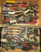 TWO BOXES CONTAINING A SELECTION OF HORNBY AND TRIX MODEL RAILWAY TRUCKS, TENDERS & RUNNING GEAR