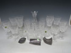 A COLLECTION OF WATERFORD CRYSTAL GLASSWARE TO INCLUDE A DECANTER AND TWENTY FOUR GLASSES,