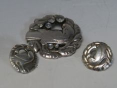 GEORG JENSEN. A George Jensen dove brooch with cabochon moonstone embellishment, stamped 123,