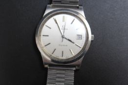 AN OMEGA GENEVE DAY DATE WRIST WATCH, in an Omega box, Dia 3.75 cm